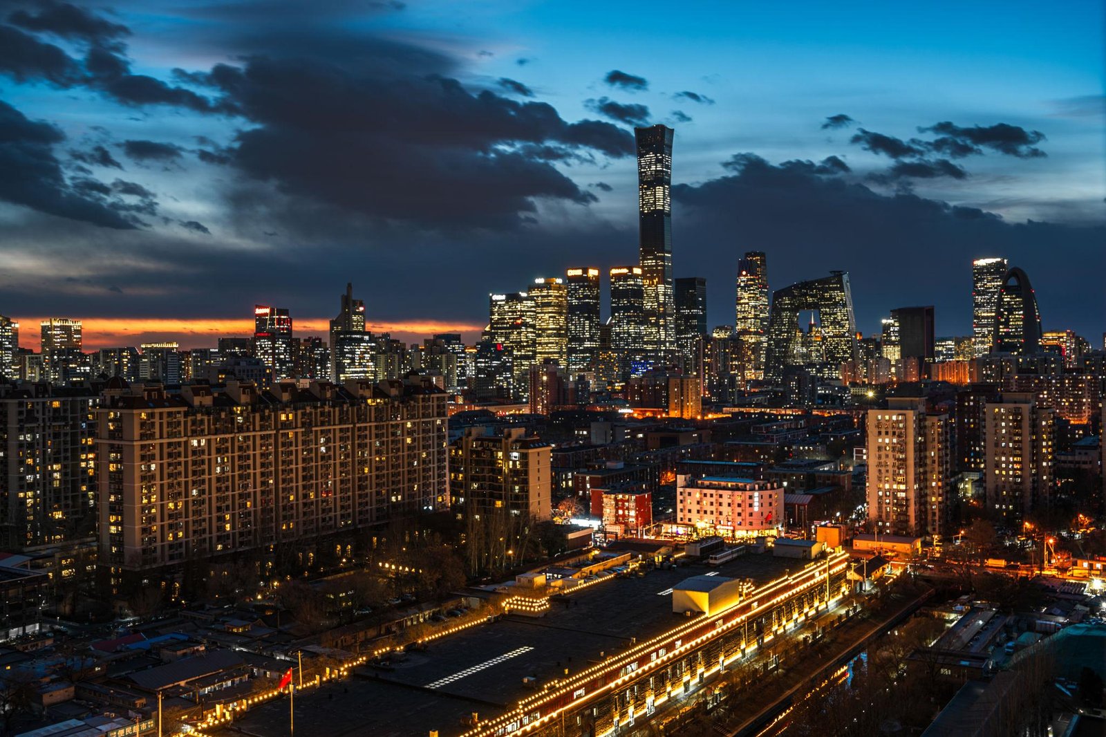 Beijing skyline at night with modern buildings and city lights